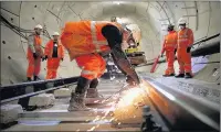  ??  ?? TUNNEL VISION: Staff put in 330,000 hours of work on the Crossrail project over 10 days at Christmas