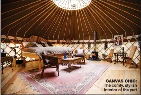  ??  ?? CANVAS CHIC: The comfy, stylish interior of the yurt