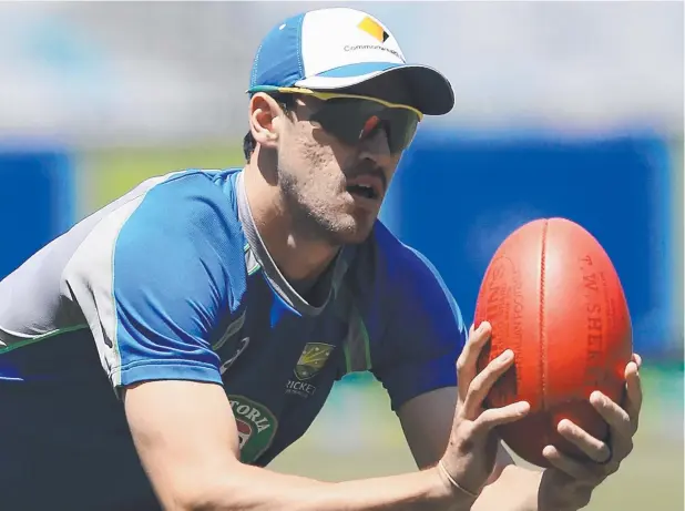  ??  ?? IN A GOOD SPACE: Mitchell Starc got familiar with a different ball during Australia’s cricket training at the MCG and can’t wait for Boxing Day. Picture: WAYNE LUDBEY