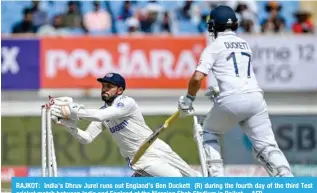  ?? ?? RAJKOT: India’s Dhruv Jurel runs out England’s Ben Duckett (R) during the fourth day of the third Test cricket match between India and England at the Niranjan Shah Stadium in Rajkot.—AFP