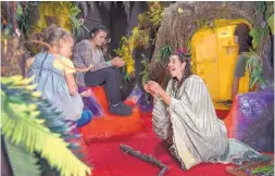  ?? EDDIE MOORE/JOURNAL ?? Amy Glasser as Tula Rose performs with plants as part of Meow Wolf’s “Summer in the Multiverse” at its House of Eternal Return in Santa Fe on May 31.