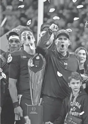  ?? KIRBY LEE/USA TODAY SPORTS ?? Jim Harbaugh led the Wolverines to their first national football championsh­ip since they shared a title in 1997.