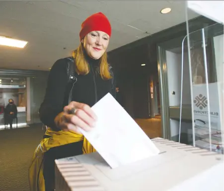  ?? JASON PAYNE ?? Brenda Bailey, shown here casting her ballot at an advance poll, was successful in her bid to capture the Vancouver-False Creek riding for the New Democrats in Saturday's election — part of a strong showing for the party in the Vancouver area.