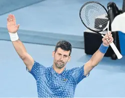  ?? AFP ?? Novak Djokovic celebrates his win against Alex de Minaur.
