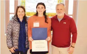  ?? ?? Lana Joy Ballard of Starkville Christian School pictured with her parents Chris and Robin Ballard. (Photo by Cal Brown, SDN)