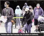  ??  ?? Visitors enter San Francisco Zoo & Gardens in California.
