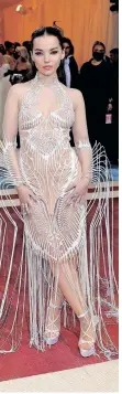  ?? ?? DOVE Cameron arrives at the Met Gala at the Metropolit­an Museum of Art in New York City on Monday. The theme for 2022 was “In America: An Anthology of Fashion”. | Reuters