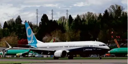  ?? TED S. WARREN/AP FILE ?? The FAA ordered an estimated 171 Boeing jetliners temporaril­y grounded after a plug covering an unused exit door blew off an Alaska Airlines Boeing 737 Max 9 in flight.