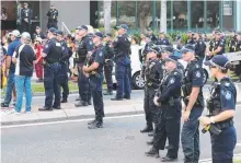  ??  ?? There was a heavy police presence at the protest.