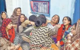  ?? PTI ?? Family members mourn the death of CRPF jawan Koushal Kumar Rawat, in Agra on Friday.