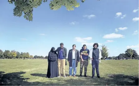  ?? ANDREW FRANCIS WALLACE/TORONTO STAR FILE PHOTO ?? From left, Maryam, Yusuf, Ghulam-Guos, Sohrab, Raustram Ali, the family of Soleiman Faqiri, who died at the Central East Correction­al Centre in Lindsay a year ago, near his grave in Ajax.