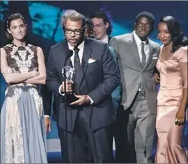  ?? Genaro Molina Los Angeles Times ?? DIRECTOR JORDAN PEELE accepts the sci-fi/horror award for “Get Out.”