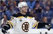  ?? JEFF ROBERSON - THE ASSOCIATED PRESS ?? FILE - In this June 1, 2019, file photo, Boston Bruins defenseman Torey Krug celebrates a teammate’s goal against the St. Louis Blues during the first period of Game 3 of the NHL hockey Stanley Cup Finals, in St. Louis.