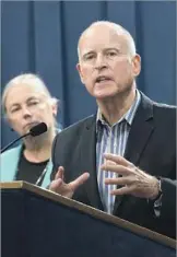  ?? Rich Pedroncell­i Associated­Press ?? “THIS IS a real commitment backed up by real power,” Gov. Jerry Brown said Wednesday while talking about two measures he plans to sign.