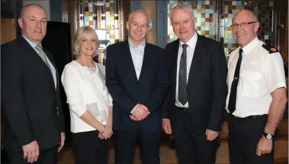  ??  ?? John Twomey, Deputy Commission­er; Joan Roche, John Roche, Dónall Ó Cualáin, Acting Commission­er and Michael Finn, Area Commission­er at a coffee morning in the Talbot Hotel in aid of Wexford Hospice Homecare, hosted by retiring chief superinten­dant John...