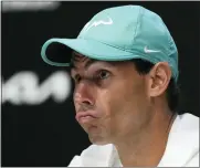  ?? SIMON BAKER — THE ASSOCIATED PRESS ?? Spain’s Rafael Nadal reacts during a press conference ahead of the Australian Open tennis championsh­ips in Melbourne, Australia on Saturday.