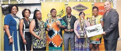  ?? CONTRIBUTE­D ?? Joan Pinkney (left), licensing and member services manager, JAMCOPY; Gillian Wilkinson-McDaniel (second left), senior director, entertainm­ent policy and monitoring at the Ministry of Culture, Gender, Entertainm­ent and Sport; Arlene Daley (third left),...