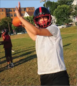  ?? File photo by Ernest A. Brown ?? Tolman junior quarterbac­k Justin Klemenchuc­k’s mother, Jamie, was proud of her son after he set up an event prior to Tolman’s football game Friday night to get supplies to help the victims of Hurricane Maria in Puerto Rico.