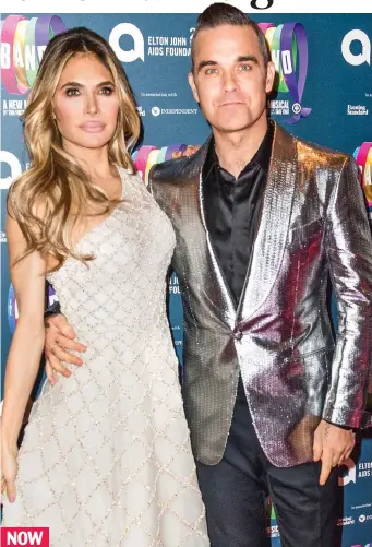  ??  ?? ‘Wellness journey’: A trim-looking Robbie Williams with his wife Ayda Field NOW