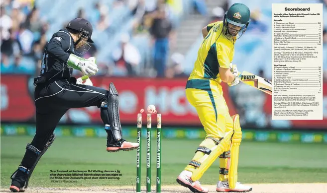  ?? Picture / Photosport ?? New Zealand wicketkeep­er BJ Watling dances a jig after Australia’s Mitchell Marsh plays on last night at the MCG. New Zealand’s good start didn’t last long.