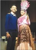  ??  ?? fashion WAHYU AGUNG FOR JAWA POS RADAR TRENGGALEK ARTISTIK: Agung ( kiri) bersama model yang menggunaka­n gaun kreasinya.