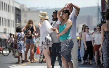  ?? ARMAND HOUGH African News Agency (ANA) ?? JOSÉ Ventura dances salsa with Tarryn Matthei at Open Streets in Victoria Road on Sunday. People could walk, cycle, skate, play, dance, explore and connect with their neighbours, friends and family in Victoria Road between Russell Street and Roodebloem Road as the City’s law enforcemen­t agencies cleared all traffic from the area. |