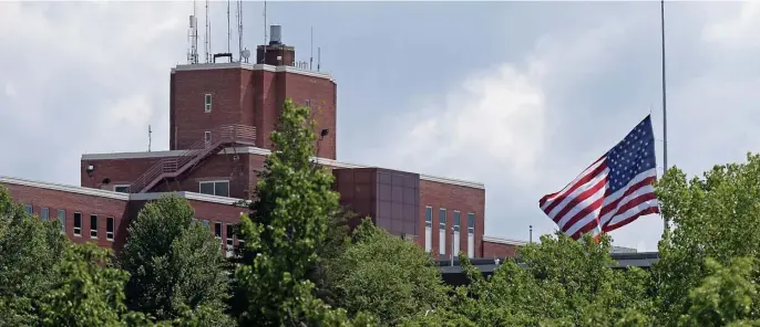  ?? STuART cAHILL / HeRALd sTAFF FILe ?? ‘WHAT IF THEY HAD LISTENED?’ The retired superinten­dent of the Holyoke Soldiers’ Home, Paul Barabani, testified Wednesday in Washington about systemic problems at the facility, seen above. Below, personnel walk outside the home.