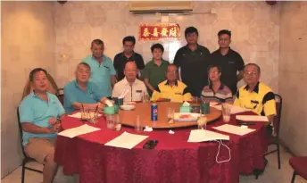 ??  ?? (Seated from third left) Leong, Ngu, Chua, and Lee with other JKKK members.