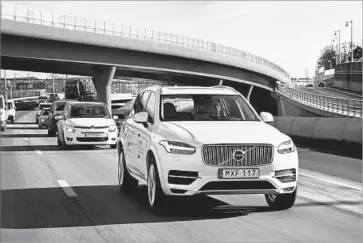 ?? Volvo ?? UBER WILL use Volvo XC90s, above, and Ford Focuses in Pittsburgh, where it has a self-driving research lab. The firm will select customers as ride volunteers and an employee will be at the wheel in case things go wrong.