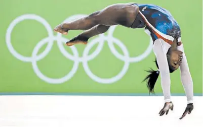  ?? DAVID GOLDMAN/AP ?? Simone Biles performs on the floor during the artistic gymnastics in the 2016 Games.