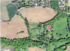  ?? ?? Bird’s eye view It’s planned at the top of the walled garden, to the left of the red marker