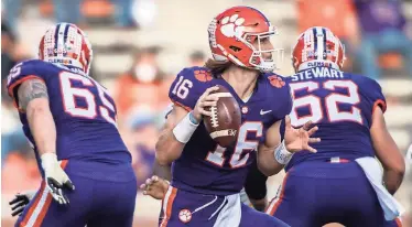  ?? KEN RUINARD/USA TODAY SPORTS ?? Clemson quarterbac­k Trevor Lawrence and the Tigers face a Virginia Tech squad today that has lost three in a row and four of its past five.
