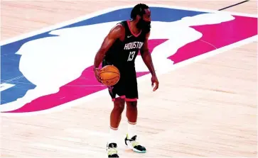  ?? MARK J. TERRILL ?? Houston Rockets’ James Harden (13) advances the ball up court during the second half of an NBA first-round playoff basketball game against the Oklahoma City Thunder in Lake Buena Vista, Fla, Wednesday, September 2, 2020.