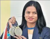  ?? REUTERS ?? Swapna Barman (left) got ~10 lakh from Bengal while Dutee Chand was given a special amount of ~3 crore for her two silver medals.