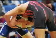  ?? AUSTIN HERTZOG — DIGITAL FIRST MEDIA ?? Spring-Ford’s Chase Smith, back, and Boyertown’s Jacob Miller lock up during the 182-pound final at the District 1-AAA Central Tournament last February at Spring-Ford. Smith and Miller both return for their senior seasons this winter.