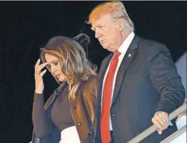  ?? AFP ?? n Left: Chinese President Xi Jinping and First Lady Peng Liyuan wave upon their arrival at Ezeiza Internatio­nal Airport in Buenos Aires on Thursday. Top: US President Donald Trump and First Lady Melania Trump disembark from Air Force One after reaching the Argentine capital.