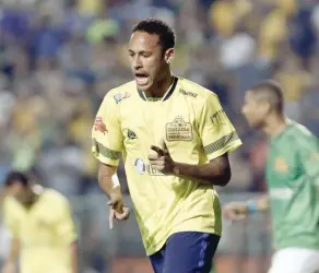  ?? — AFP ?? Brazil’s Neymar of Spanish team Barcelona celebrates his goal during the charity football match Ousadia vs Pedalada at Pacaembu stadium in Sao Paulo. Donations in tribute to the victims of the November 28, 2016 Colombia plane crash carrying nearly the...