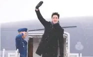  ?? THE CANADIAN PRESS/FILES ?? Prime Minister Justin Trudeau waves from the steps of his plane as he departs Ottawa.