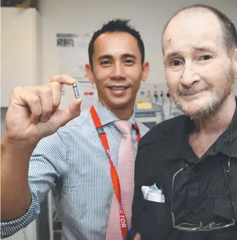  ?? LIFE SAVER: Cardiac electrophy­siologist Dr Kevin Ng and his patient, Mount Isa resident Hilary Petrie. ??