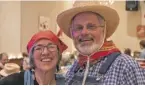  ??  ?? Barbara Adolfi and Father Tuck Grinnell of St. Peter Catholic Church dressed in their finest farm attire to celebrate this year’s Benevolent Fund theme, “Meet Me at the Farmer’s Market.” Father Tuck is chair of the Fund’s executive committee. He gave...