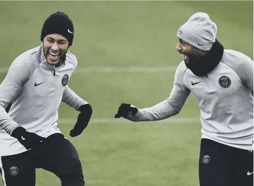  ??  ?? 0 Neymar, who cost PSG a world transfer record fee of £200m, trains in the Parc des Princes last night with fellow Brazilian Lucas.