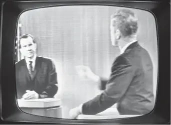 ?? THE ASSOCIATED PRESS ?? In this Oct. 21, 1960file photo taken a television in New York displays a debate between Republican presidenti­al candidate Vice President Richard M. Nixon, left, and Democratic presidenti­al candidate Sen. John F. Kennedy, D-Mass. The 1960presid­ential election offered the country’s first televised debates.