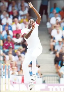  ??  ?? West Indies cricketer Jason Holder delivers a ball during the first day of the final match of a three-match Test series between England and West Indies at the
Kensington Oval Stadium in Bridgetown, on May 1. (AFP)