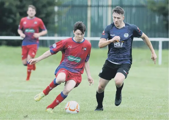  ?? ?? Silksworth CW (navy) take on FC Hartlepool in the Wearside League.