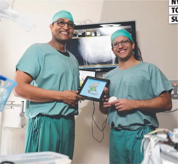  ?? DOUBLE DOCS: Dr Kaushik Hazratwala with New York surgeon Dr Jonathan Vigdorchik at the Mater Hospital. Picture: EVAN MORGAN ??