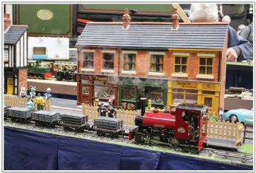  ??  ?? Roundhouse Bertie on the slates. John Wenlock’s street modules with shops. (Photo: Steve Atkinson)