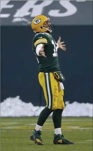  ?? JEFFREY PHELPS — THE ASSOCIATED PRESS ?? Green Bay Packers quarterbac­k and Chico native Aaron Rodgers reacts after his 2-yard touchdown pass to Davante Adams against the Tampa Bay Buccaneers during the second half of the NFC championsh­ip game in Green Bay, Wis., on Sunday.