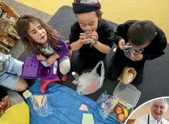  ?? JOSEPH JOHNSON/STUFF ?? Children at Haeata Community Campus dig in to a meal provided by Eat My Lunch.