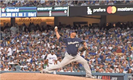  ?? GETTY IMAGES ?? Jhoulys Chacín delivered 51⁄3 innings of gutty pitching, working around three hits and two walks.