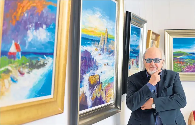  ?? Picture ?? Jolomo at his Morrison & The Sea – The Rocks – The Cliffs exhibition in Crieff.
Colin Hattersley